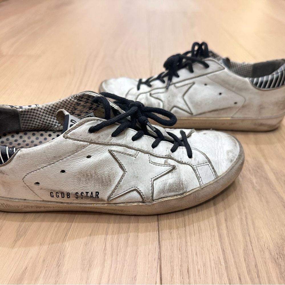 Golden Goose Distressed White Sneakers with Black Accents